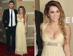 MILEY CYRUS DESLUMBRA CON SEXY VESTIFO-FOTOS