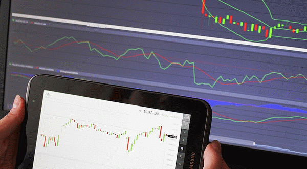 ¿Qué es el trading y cómo se puede ganar dinero con esta actividad?